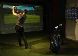 Golf swing practice in action in Next Level Golf indoor virtual golf studio with Trackman technology - Why TrackMan 4 Powers the Future of Indoor Golf blog post